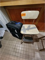 Chair and suitcase