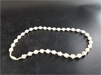 Stunning ivory fluted beaded necklace with small i