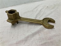 Brass barrel wrench.