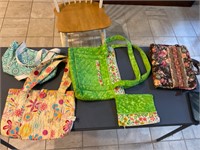 Assorted very Bradley style bags and Bible cover