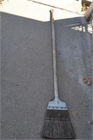 broom with scraper