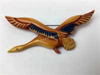 Carved Bakelite goose brooch 16 grams
