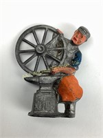 Old lead toy man forging iron wheel