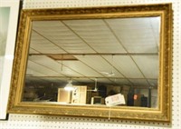 Lot #718 - Rectangular gold framed mirror 39”x