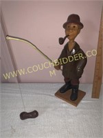 Unique carved wooden fisherman statue