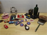 Patches, mirror, bottle, pocket watch, misc.