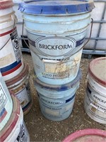 2 buckets of concrete color