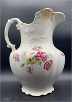 Porcelain Floral Pitcher Has Multiple Cracks