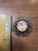 Round cherub cameo pin