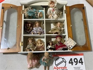 PORCELAIN DOLLS IN WALL DISPLAY