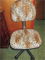 Leopard print rolling chair