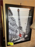 Hologram framed pic of lady in red coat and Eifel