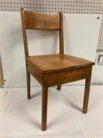 Retro child’s wood school chair.