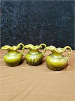 Group of 3 unmarked green pitchers approx 5