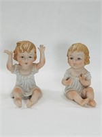 Pair of Small Bisque Piano Babies Figurines