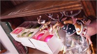 Group of Christmas decor: wine glasses, reindeer