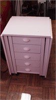 White five-drawer sewing table with drop leaves