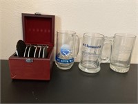 Glass beer mugs and coasters