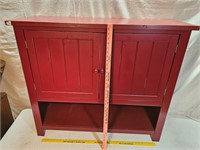 Red wooden cabinet