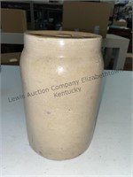 Stoneware jar with lid has imperfections