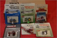 6 Small Toy Tractors in Packages