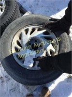 C589 -  (4) 15" Ford tires with rims