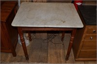 Old white marble top (broken) small table