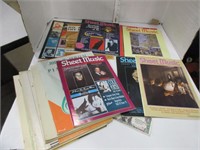 Collection of piano sheet music & learning books