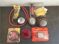 Box of assorted trailer lighting, multi-use pump,