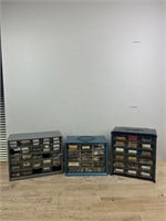 Three tool storage boxes with tools inside