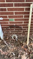 Small metal wagon wheel