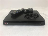 LG Blu-Ray disc player with remote. Approx. 11” w