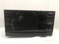 Whirlpool household microwave oven. Approx. 18”