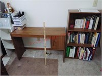 White storage shelf, desk & bookshelf w/ books
