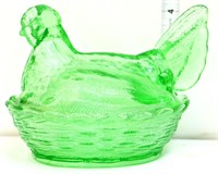 Green glass hen on nest