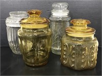 Clear and yellow glass jars with lids