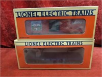 (2)Lionel New cars. Cherry picker, Boxcar.