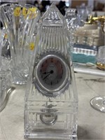 Lead pendulum crystal clock