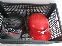 lot of Baseball Helmets and Softballs