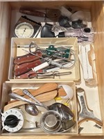 Drawer full of kitchen utensils