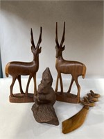 Wooden antelopes, turtle, and sword and resin