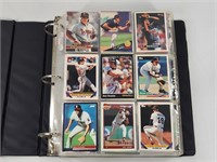 BINDER FULL OF ASSORTED BASEBALL CARDS