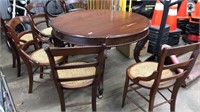 ANTIQUE WOOD DINING TABLE & 7 DINING CHAIRS