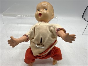 Vintage wind up baby toy