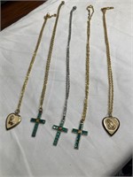 3 Cross necklaces and 2 praying hands necklaces