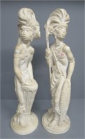 African figurines. Measures: 26.5" Tall.