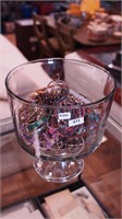 Container of costume jewelry: Viva