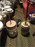 TWO BUTTER CHURNS- ONE ON LEFT IS DAMAGED
