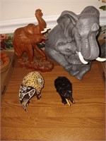 4 elephant figurines.