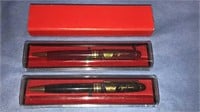 aTwo George Bush presidential pens, red and black,